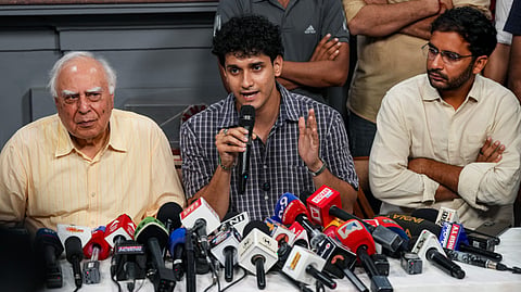 Rajya Sabha MP Kapil Sibal, CJP spokespersons Saurav Das and Ashutosh Ranka during a press conference on the aftermath of the student protests over the NEET paper leak, in New Delhi, Monday, July 27, 2026. 