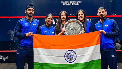 Anahat Singh (C) with coaches and staff members of Indian team