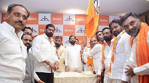 The Shiv Sena said key leaders from Ahilyanagar, led by MP Bhausaheb Wakchaure, including Sachin Badde and Hariram Shelke, joined the Eknath Shinde-led party.