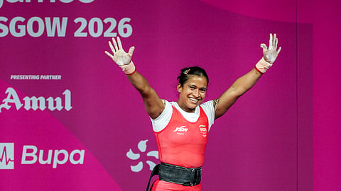 Gyaneshwari celebrates at the weightlifting event