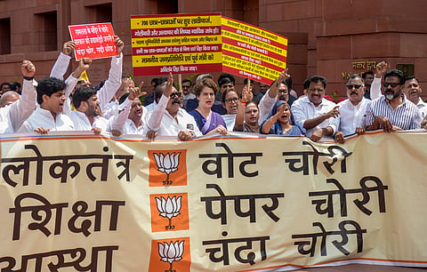 Congress MPs Priyanka Gandhi Vadra, Imran Pratapgarhi, Sanjana Jatav, and others, stage a protest during the Monsoon session of Parliament, in New Delhi, Monday, July 27, 2026. 
