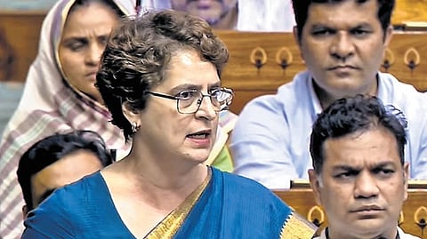 Congress MP Priyanka Gandhi, Union education minister Pralhad Joshi during the Monsoon Session of Parliament on Tuesday