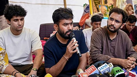 Cockroach Janta Party (CJP) founder Abhijeet Dipke (Centre)