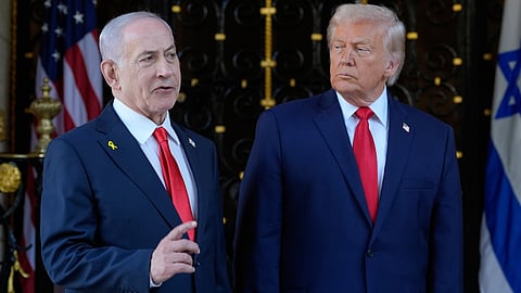 President Donald Trump listens as Israel's Prime Minister Benjamin Netanyahu speaks at President Donald Trump's Mar-a-Lago club, Dec. 29, 2025, in Palm Beach, Fla.