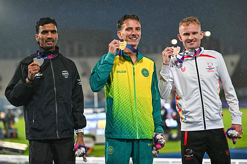 Gulveer Singh (L, silver), Ky Robinson (C, gold) and David Mullarkey (R, bronze) pose with their medals