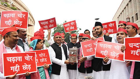 Samajwadi Party chief Akhilesh Yadav and other SP MPs stage a protest at the Makar Dwar over alleged financial irregularities concerning the Ram Temple funds during the ongoing Monsoon Session of Parliament in New Delhi on Wednesday, July 29, 2026.