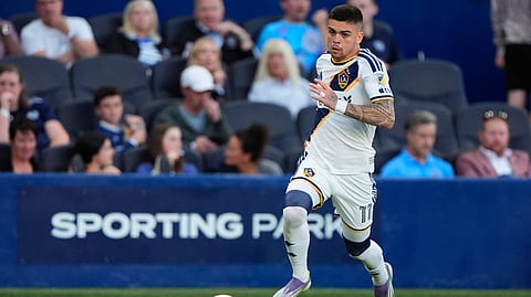 LA Galaxy forward Gabriel Pec moves the ball during the first half of an MLS soccer match against Sporting Kansas City, Wednesday, May 13, 2026, in Kansas City, Kan.