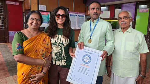 Arun Prasad and his parents with actor Manju Warrier