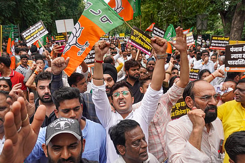  BJP supporters stage a protest at Aam Aadmi Party office demanding the resignation of Punjab Education Minister Harjot Singh Bains over alleged paper leaks in the state, in New Delhi, Thursday, July 30, 2026.
