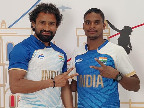 Dilip Gavit with coach Vaijnath Kale