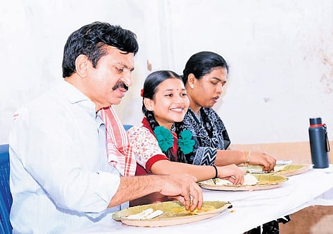 Revenue Minister Ponguleti Srinivasa Reddy shares a mid-day meal with students at the Gollagudem Ashram Girls’ High School on Wednesday