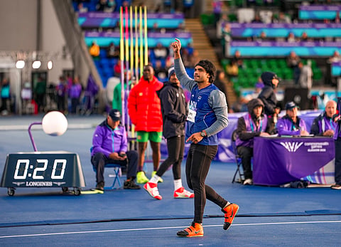Neeraj Chopra reacts after his throw late on Friday