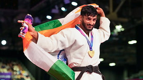 Harsh Singh celebrates his historic win in Glasgow on Friday