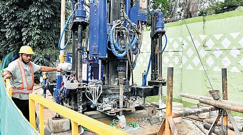 Soil samples being collected for testing at Lalbagh Botanical Gardens on Friday for the Tunnel Road project 