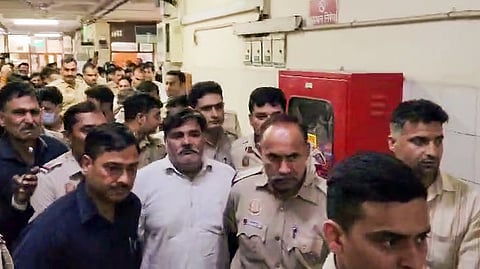 Former AAP councillor Tahir Hussain being taken as Karkardooma Court sentences life imprisonment to him in the murder case of IB official Ankit Sharma during the 2020 Northeast Delhi riots, in New Delhi on Friday. 