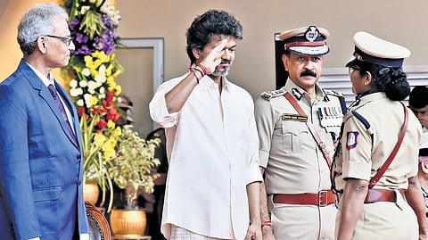 Chief Minister Joseph Vijay gives away the President's medals to the police personnel for their meritorious services at a function held at Rajarathnam Stadium in Chennai on Friday evening.