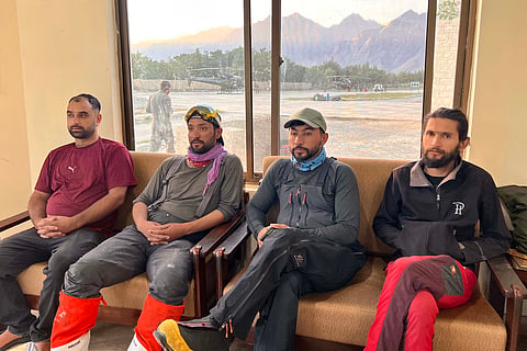 This handout photograph taken and released by Alpine Club of Pakistan on July 31, 2026 shows rescue mountaineers before departing from Skardu Air Base in Pakistan's Gilgit-Baltistan