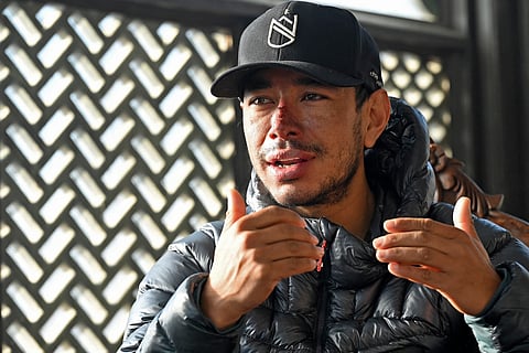 In this picture taken on January 21, 2021, Nepali mountaineer Nirmal Purja speaks during an interview 