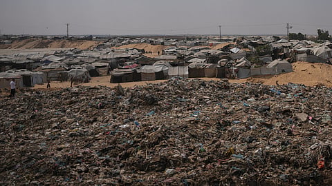 Tents sheltering displaced Palestinians stand near a landfill in Deir al-Balah, in the central Gaza Strip, Thursday, July 23, 2026. 
