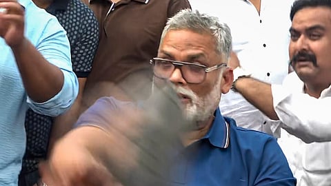 Independent MP Pappu Yadav addresses the media, in New Delhi, Sunday, Aug. 2, 2026. A man allegedly hurled a slipper at Yadav during a press conference.