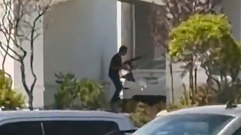 This still image captured from video by a witness shows the scene of a shooting that started at an In-N-Out Burger restaurant, Saturday, Aug. 1, 2026 in Twin Falls, Idaho.