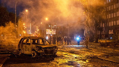 A burned car is seen after a Russian missile attack in Kyiv, Ukraine, Saturday, Aug. 1, 2026.