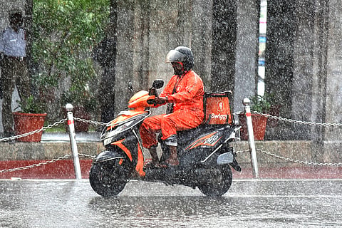 Delhi rains bring higher earnings for gig workers, but flooded roads and risks remain 