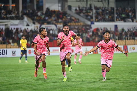 Langsning FC players celebrate a goal against Mumbai FC on Monday 