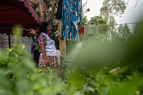 Esther Lutula, a 26 year-old woman who is four months pregnant and a mother of four, who stopped going for prenatal checkups shortly after the current Ebola outbreak, stands outside her house in Bunia, northeastern, Congo, Tuesday, June 16, 2026