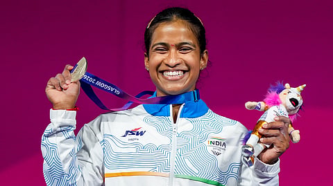 Gyaneshwari Yadav celebrates with her silver medal