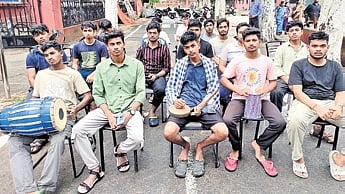 Students protesting outside East Hostel on Monday.
