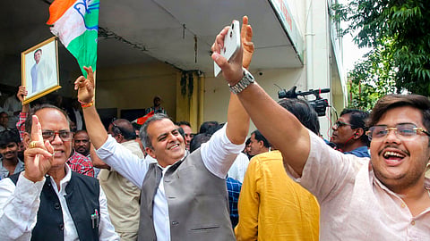 Congress workers celebrate the party's victory in the Datia Assembly by-election at the Pradesh Congress Committee (PCC) headquarters, in Bhopal, Monday, Aug. 3, 2026. Congress candidate Ghanshyam Singh defeated BJP's Ashutosh Tiwari in the bypoll. 