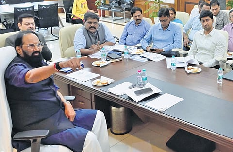 Civil Supplies Minister N Uttam Kumar Reddy gestures during a review meeting on procurement operations in Hyderabad on Tuesday