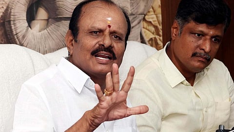  Tamil Nadu Lorry Owners Association President C Dhanraj addressing reporters in Salem on Monday.