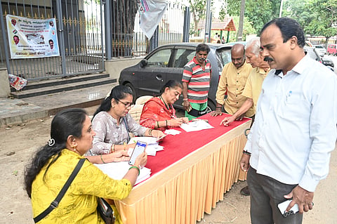 Voter ID verification at at a voter facilitation center in the Basavanagudi Assembly constituence in Bengaluru on Sunday.