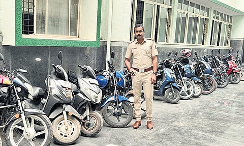 Two-wheelers seized in a crackdown on illegal bike taxi operations parked at a police station in Bengaluru on Wednesday