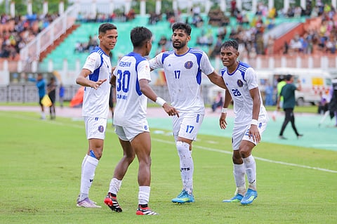 Indian Navy players celebrate after a goal on Wednesday