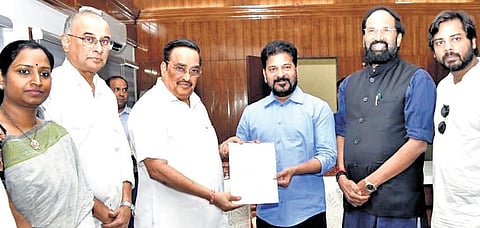 Chief Minister A Revanth Reddy meets Jal Shakti Minister CR Patil along with Irrigation Minister N Uttam Kumar Reddy and others, in New Delhi on Wednesday