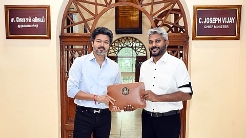 Tamil Nadu Finance Minister Marie Wilson (R) and Chief Minister C. Joseph Vijay pose for a photo ahead of the presentation of the maiden budget of the TVK-led coalition government in the Legislative Assembly in Chennai on Wednesday, Aug. 05, 2026.