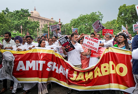 Lok Sabha LoP Rahul Gandhi and opposition MPs stage a protest march demanding Home Minister Amit Shah's statement on alleged police excesses on students