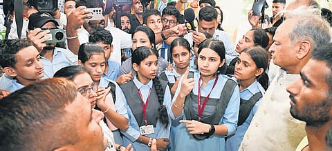 Congress leader Ashok Gehlot with students in Jaipur on Wednesday | Express