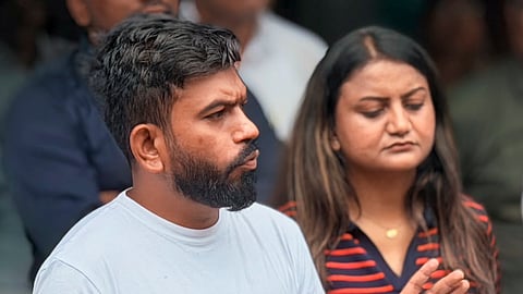 Cockroach Janta Party (CJP) founder Abhijeet Dipke, left, and team member Ratna Singh, right, during an interaction with media at the CJP's core team meeting, in Chhatrapati Sambhajinagar, Maharashtra.
