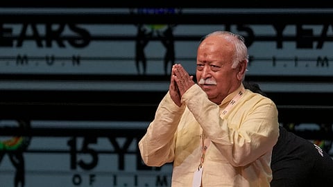  Rashtriya Swayamsevak Sangh (RSS) chief Mohan Bhagwat greets students during an India's International Movement to Unite Nations (IIMUN) event, in Mumbai, Maharashtra, Thursday, Aug. 6, 2026.