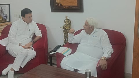 AICC General Secretary Randeep Singh Surjewala in conversation with former minister and Congress MLA HK Patil at the latter’s Bengaluru residence on Wednesday 