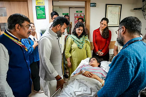 Union Minister of Civil Aviation Kinjarapu Ram Mohan Naidu visits an injured passenger at Fortis Hospital following mid-air turbulence on Air India flight AI2379 (Phuket-Delhi), in New Delhi.