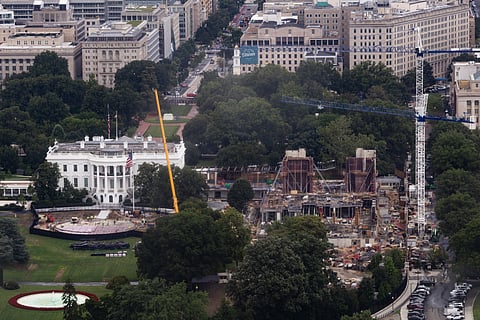 Construction continues on a helipad and the White House Ballroom on the South Lawn of the White House, Wednesday, Aug. 5, 2026, in Washington.