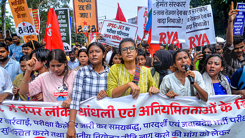 All India Student's Association (AISA) National President Neha Bora along with student demonstrators take out a protest march against the alleged irregularities of exams and paper leak of Jharkhand Public Service Commission (JPSC) and Jharkhand Staff Selection Commission (JSSC), in Ranchi, Friday, Aug. 7, 2026.