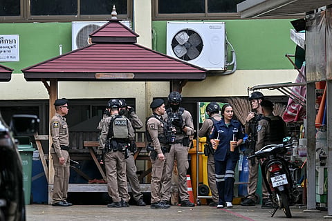 Thai police gather following a school shooting in Bang Kruai district, Nonthaburi province, north of Thailand's capital Bangkok, on August 7, 2026.