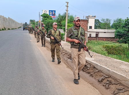 Police personnel fired warning shots at the vehicle in an attempt to force it to halt.