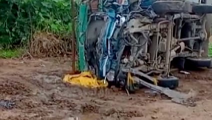 A mangled truck lies on the road after colliding with a passenger vehicle near Chhimka village on the Bhind-Gwalior National Highway, in Bhind district, Madhya Pradesh, early Tuesday, Aug. 18, 2026. Eight labourers were killed and 32 others injured.